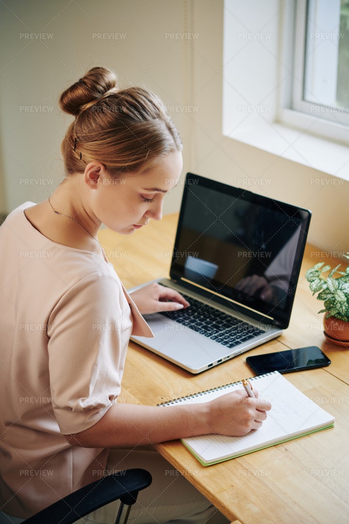 Young Woman Working Alone: Stock Photos