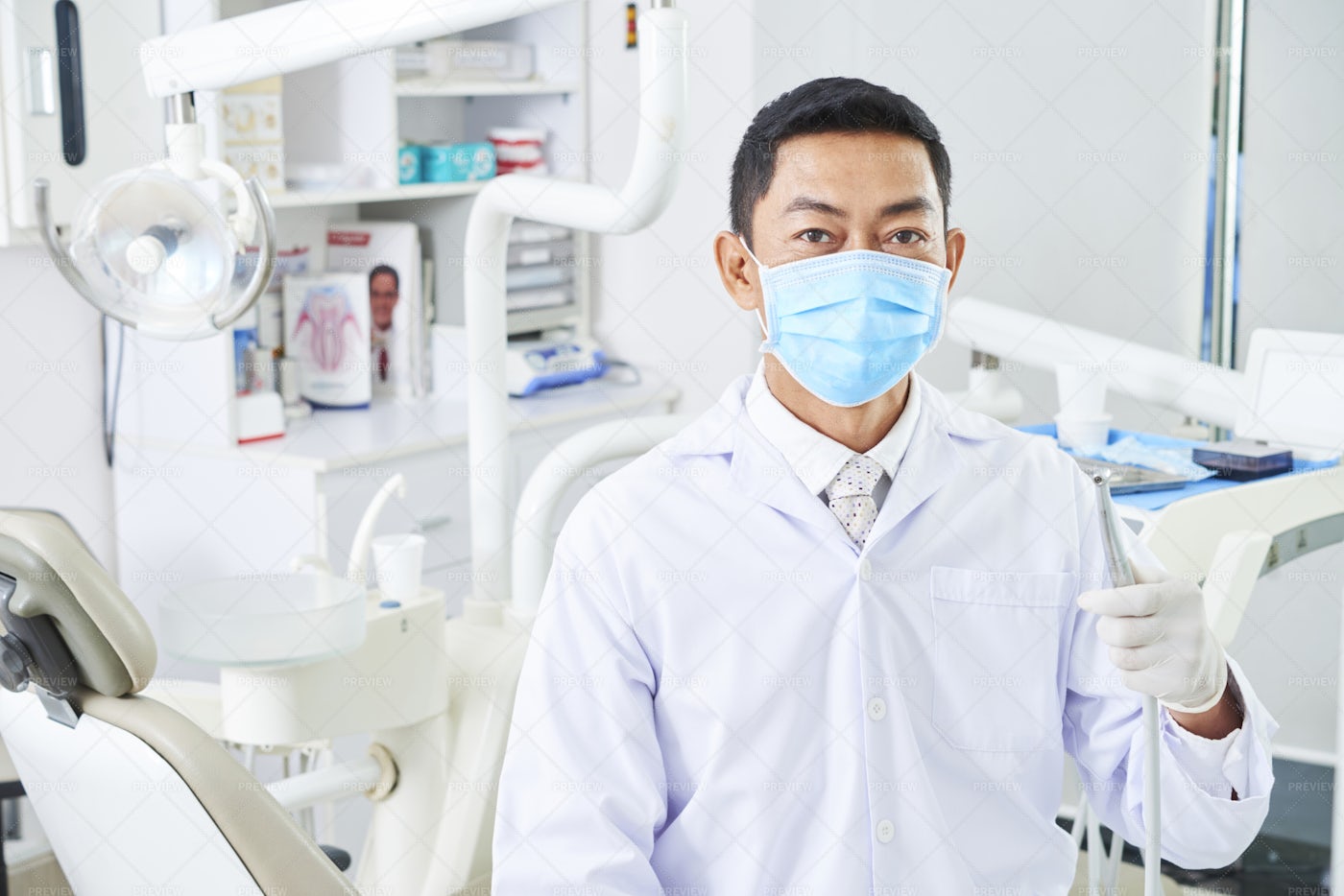 Dentist With Dental Drill: Stock Photos