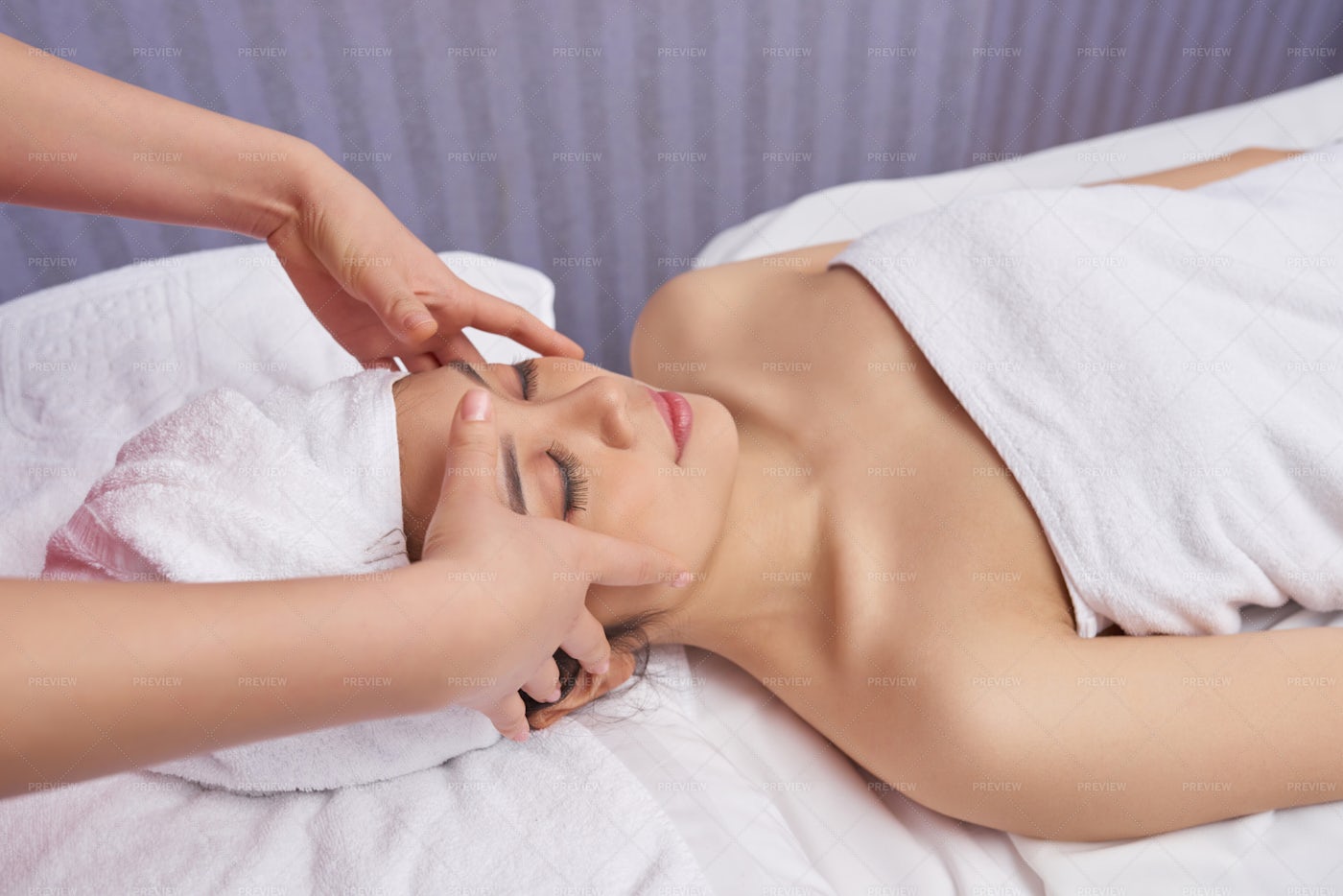 Enjoying Face Massage: Stock Photos