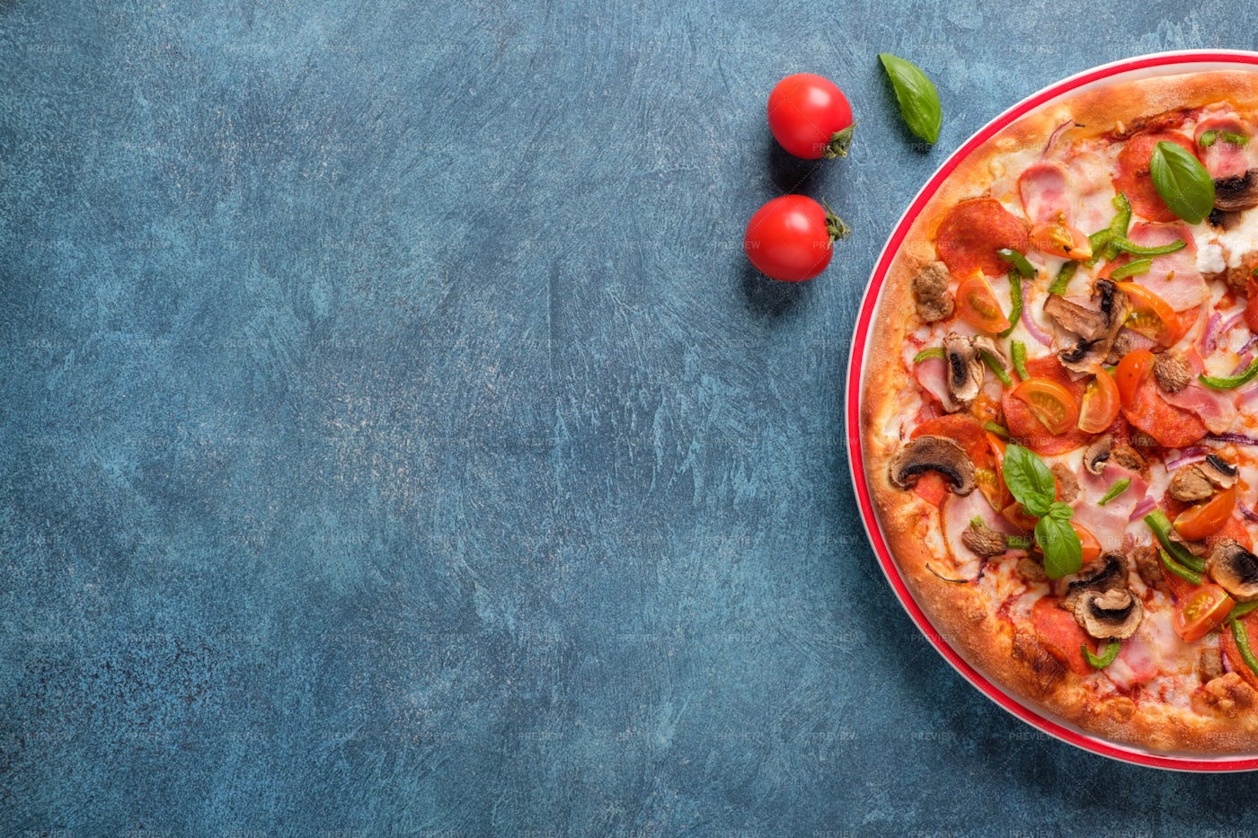 Pizza On Blue Background: Stock Photos