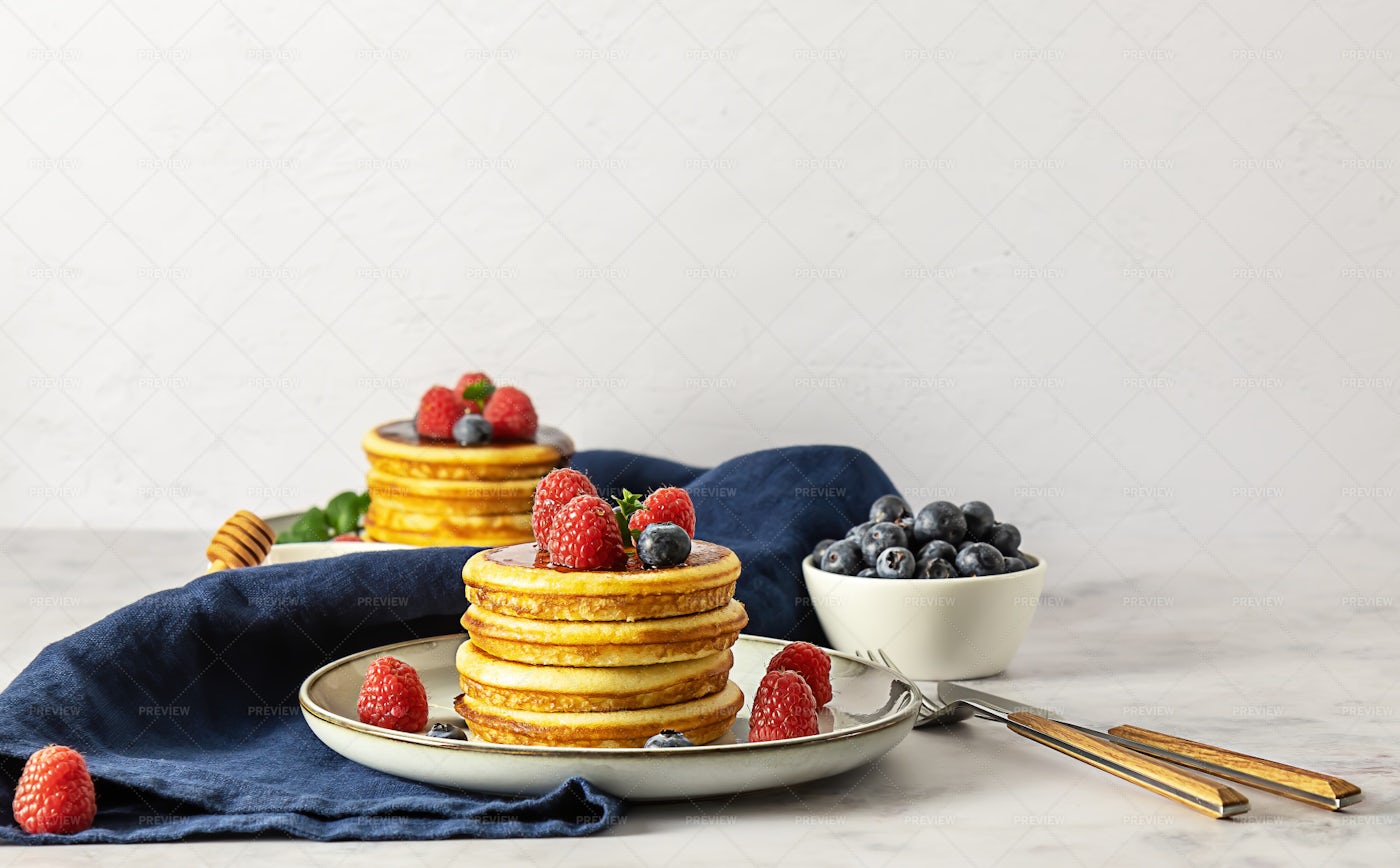 Two Plates Of Pancakes - Stock Photos | Motion Array