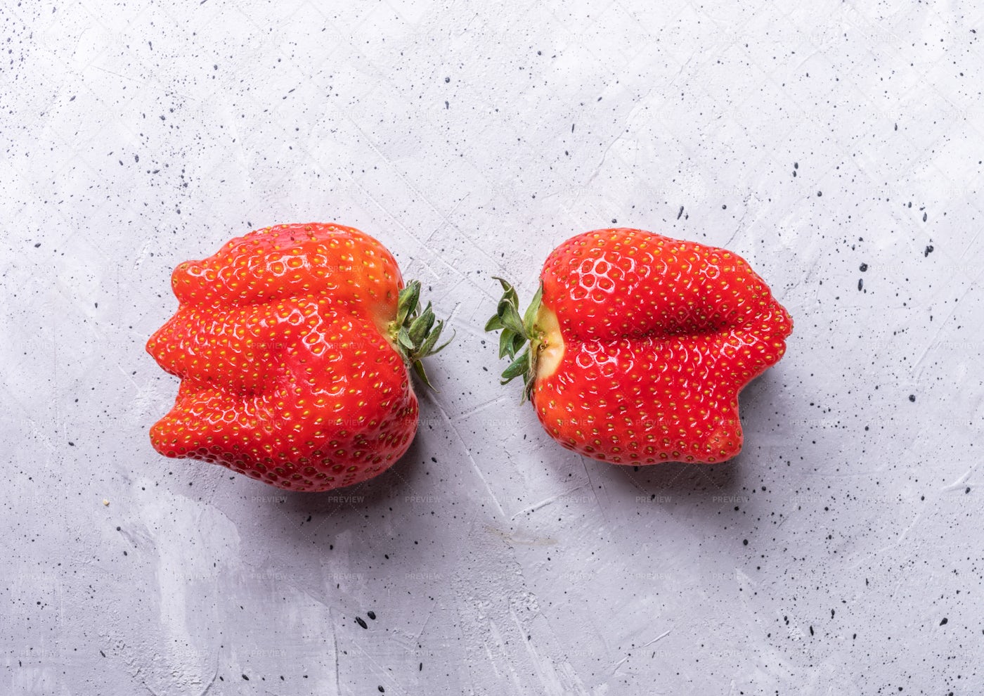 Two Ugly Strawberries: Stock Photos
