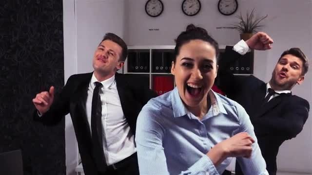 Happy Businessmen And Woman Dancing: Stock Video