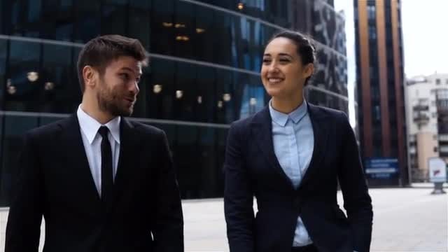 Business Colleagues Walking Outdoors: Stock Video