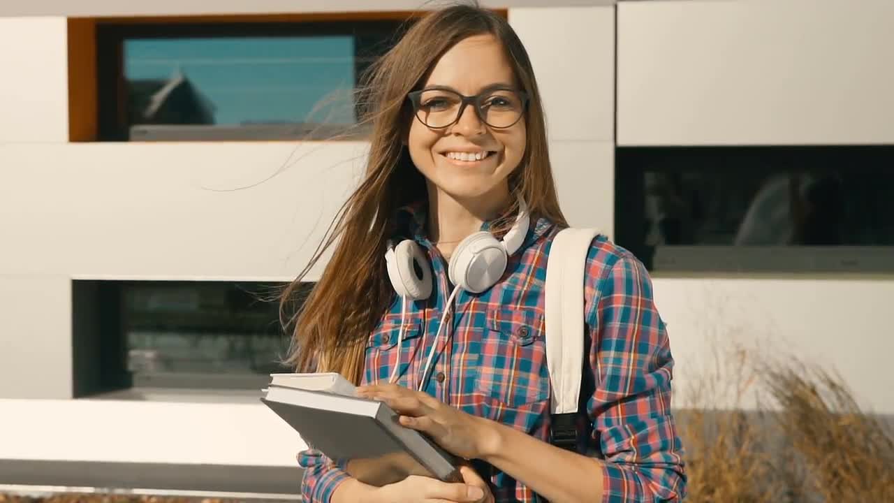 Female College Student Smiling - Stock Video | Motion Array