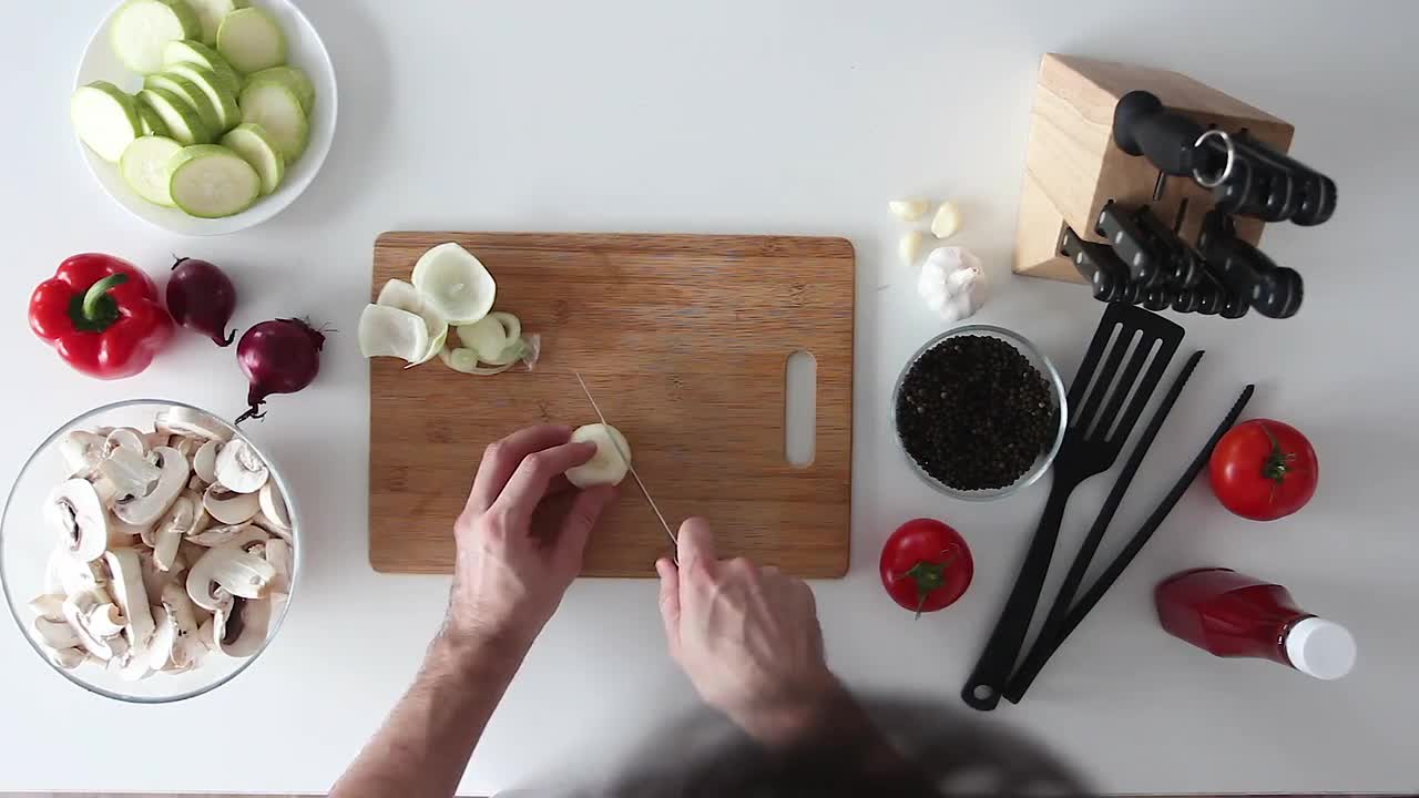 Cutting Onions On Chopping Board Stock Video Motion Array