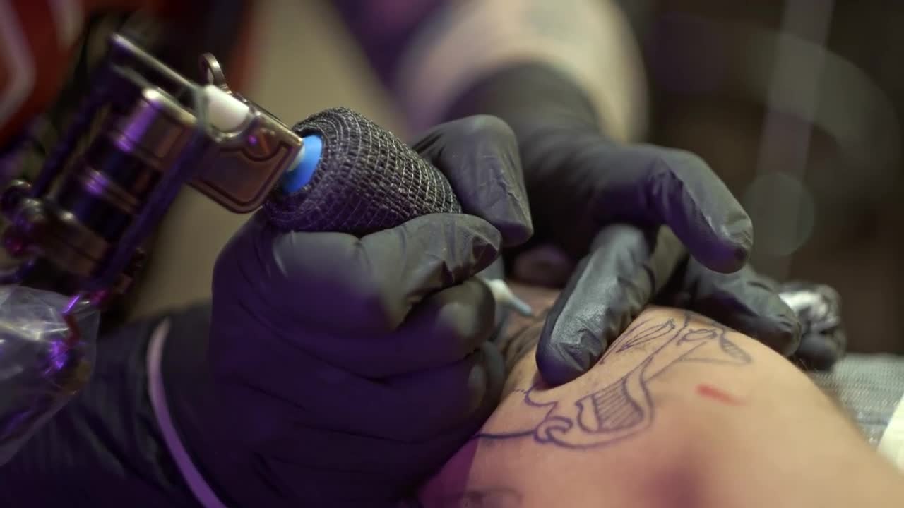 i'm a tattoo artist. here are 5 mistakes people make when getting tiny tattoos. and tattoo artist stock photo tattoo artist near me