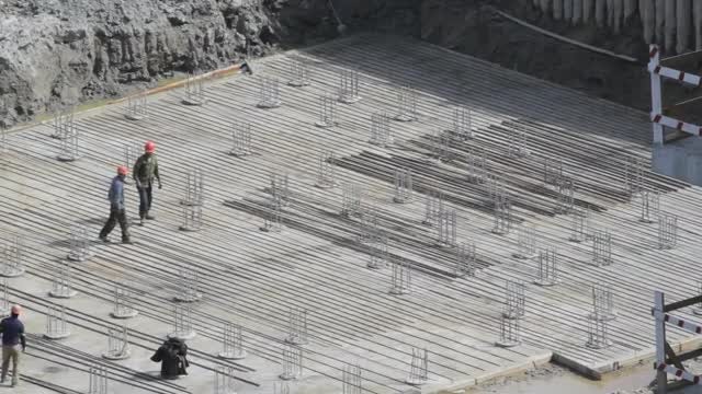 Builders Working On Foundation: Stock Video