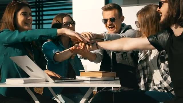 College Students Celebrate Successful Teamwork: Stock Video