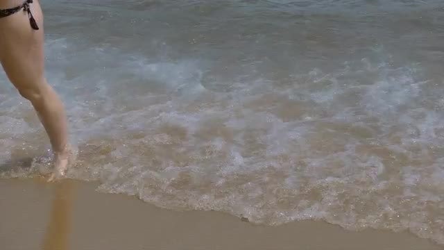 Woman Walking Out of The Sea : Stock Video