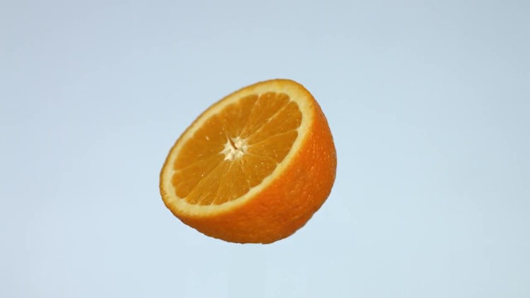 Piece Of Orange Rotating: Stock Video