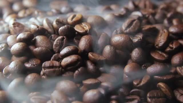 Brown Coffee Beans Being Roasted: Stock Video