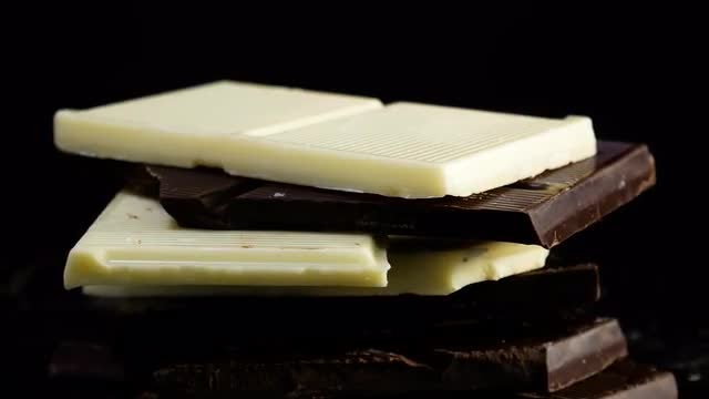 Dark And White Chocolate Rotating: Stock Video
