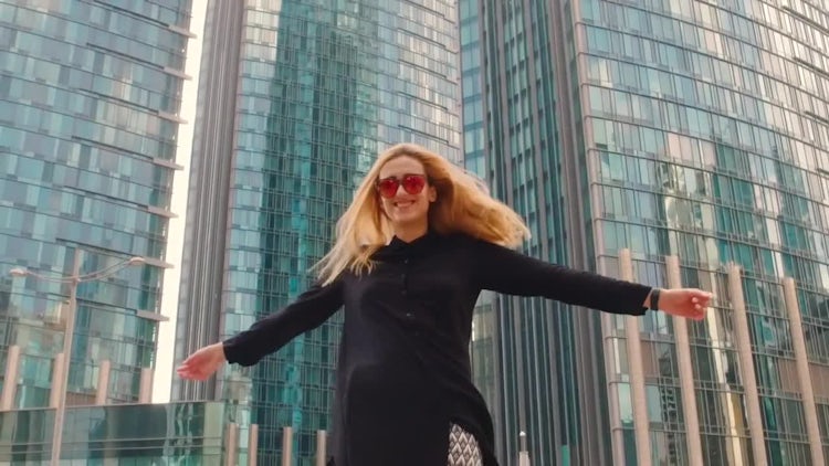 Woman Spinning In Slow Motion: Stock Video