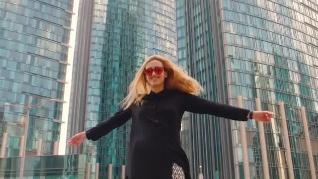 Woman Spinning In Slow Motion: Stock Video