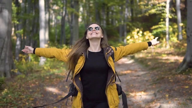 Hiking Girl In The Woods: Stock Video