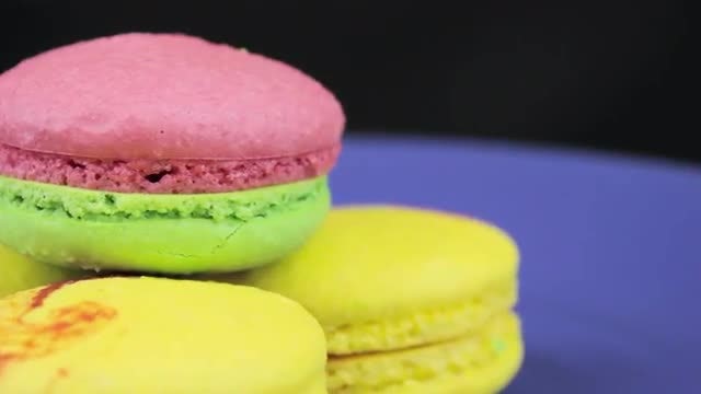 Macaroon Cookies On Rotating Display: Stock Video
