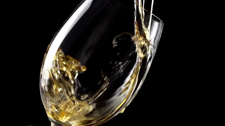 Pouring Wine Into A Glass: Stock Video