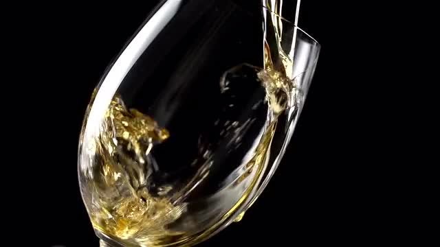 Pouring Wine Into A Glass: Stock Video