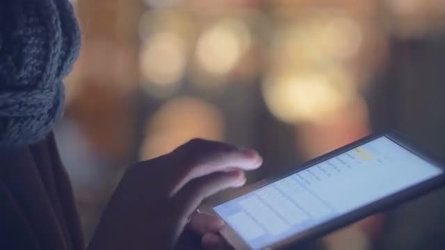 Woman Using Tablet PC Outdoors: Stock Video
