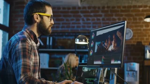 Man Working On Video Edit: Stock Video