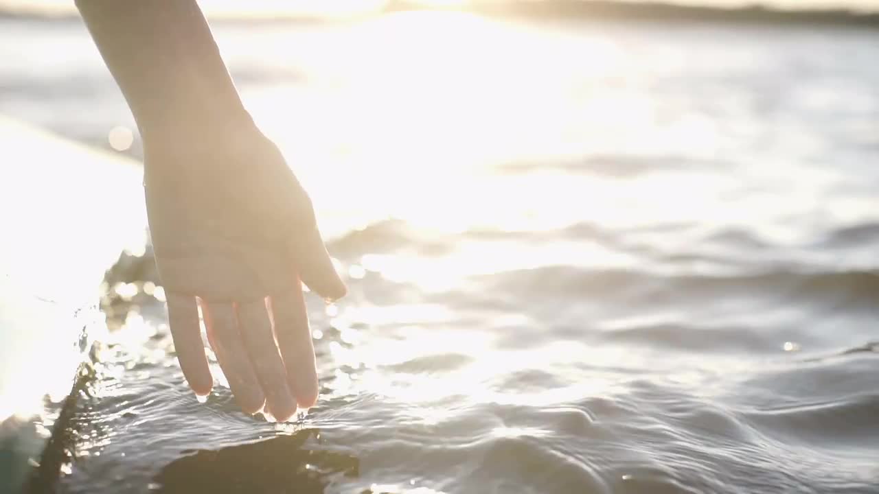 Woman's Hand In Water Close-Up - Stock Video | Motion Array