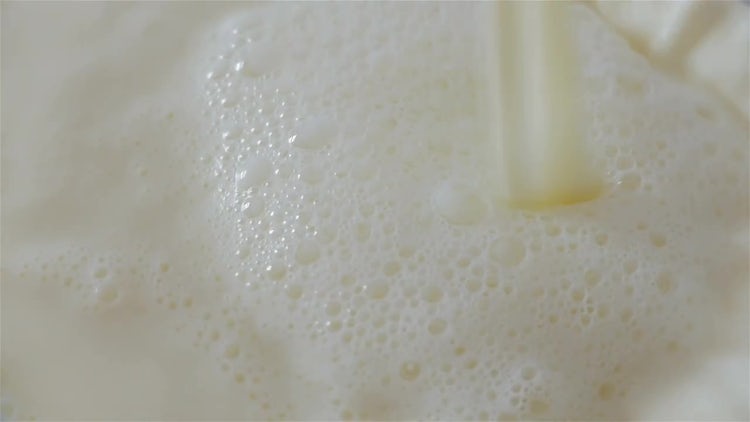 Pouring Milk On Large Container: Stock Video