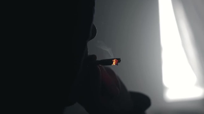 Man Lights A Cigarette In Dark - Stock Video