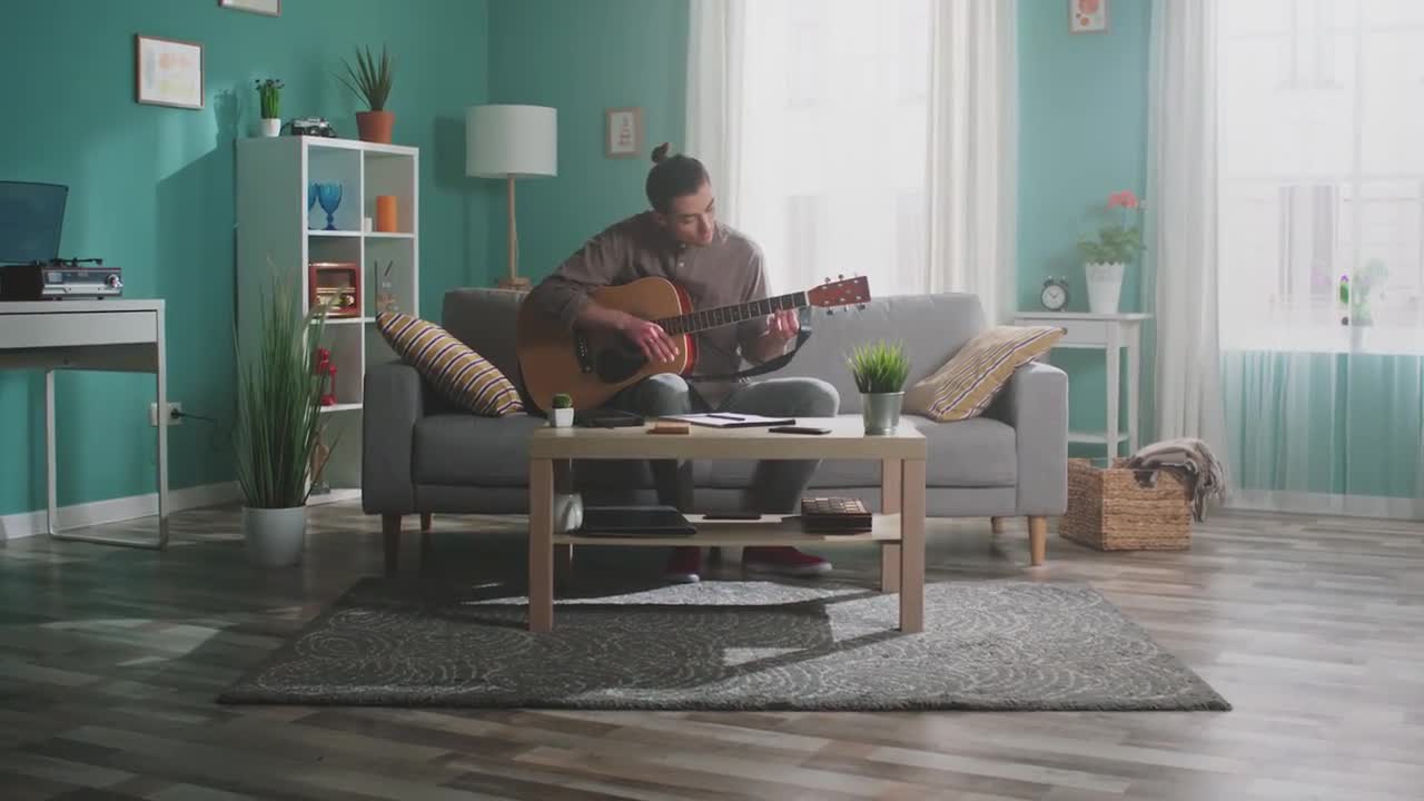 Playing Guitar In The Living Room Stock Video Motion Array