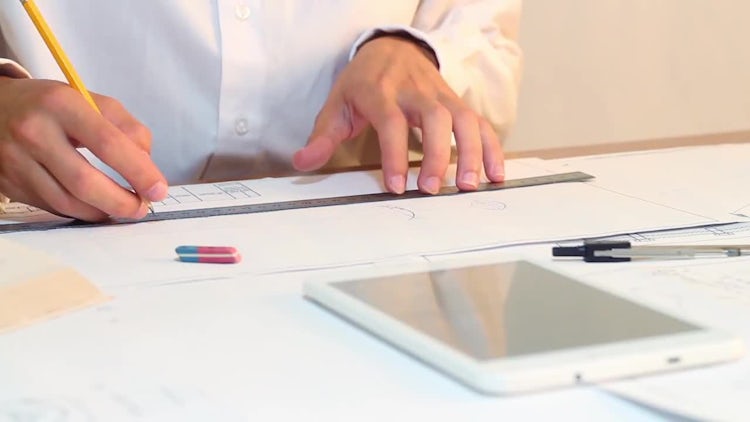 Engineer Uses Ruler And Pencil: Stock Video