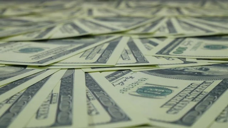 Panning Shot Of Dollar Bills: Stock Video