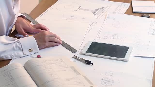 Architect Draws A Plan : Stock Video