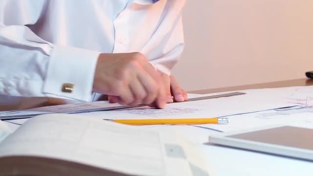 Student Engineer Erasing Drawing: Stock Video