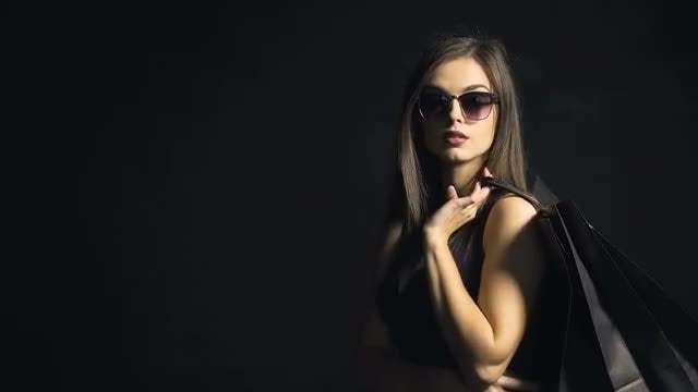 Sophisticated Girl With Shopping Bag: Stock Video