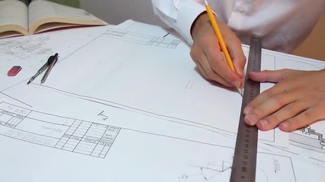 Architect Drawing With Yellow Pencil: Stock Video