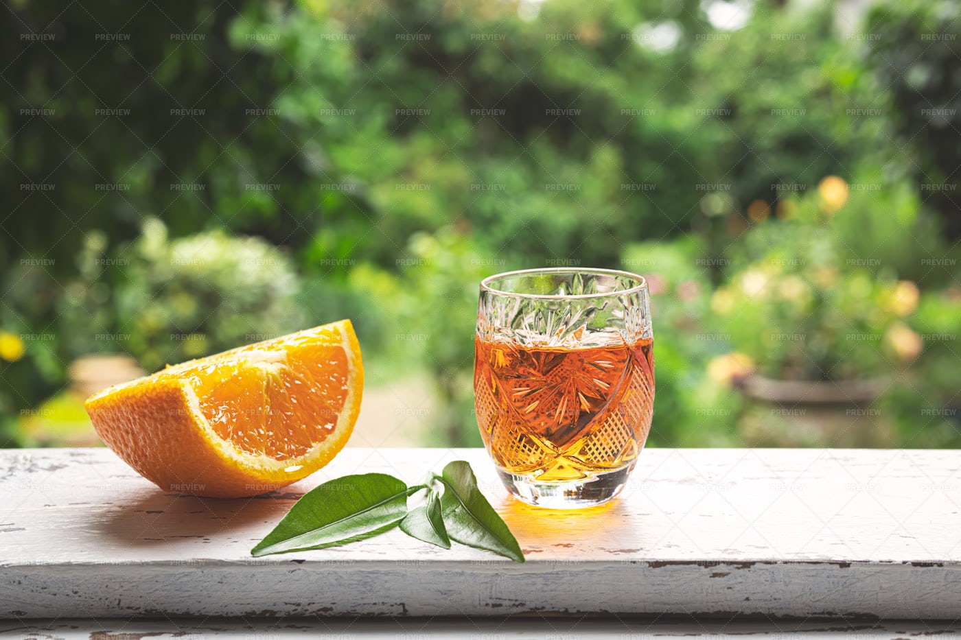 Tangerine Liqueur On A Windowsill: Stock Photos