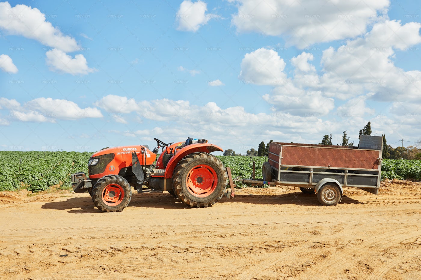 Tractor With Trailer For Harvesting: Stock Photos