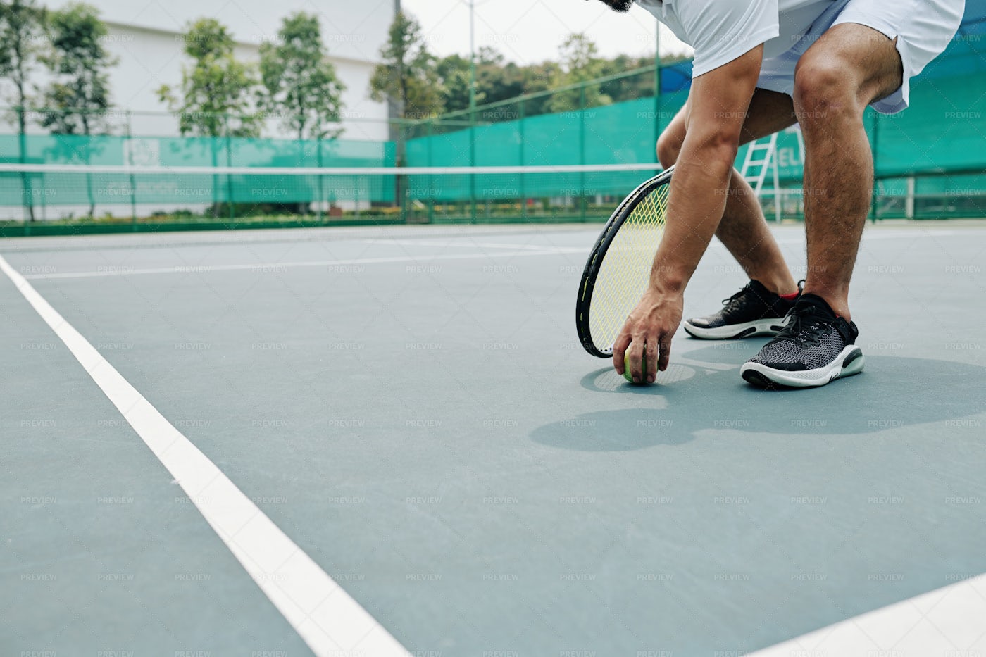 Tennis Player Taking Ball: Stock Photos