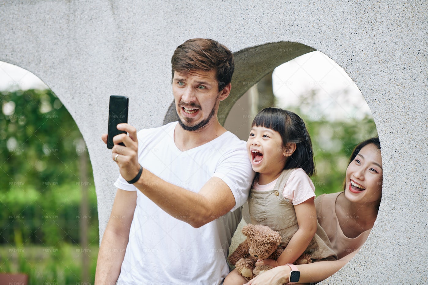 Family Taking Funny Photo: Stock Photos