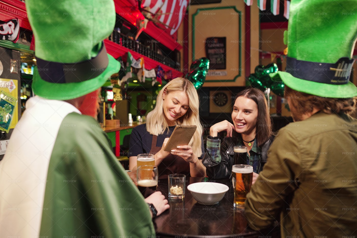 Group Of Friends In Irish Pub: Stock Photos