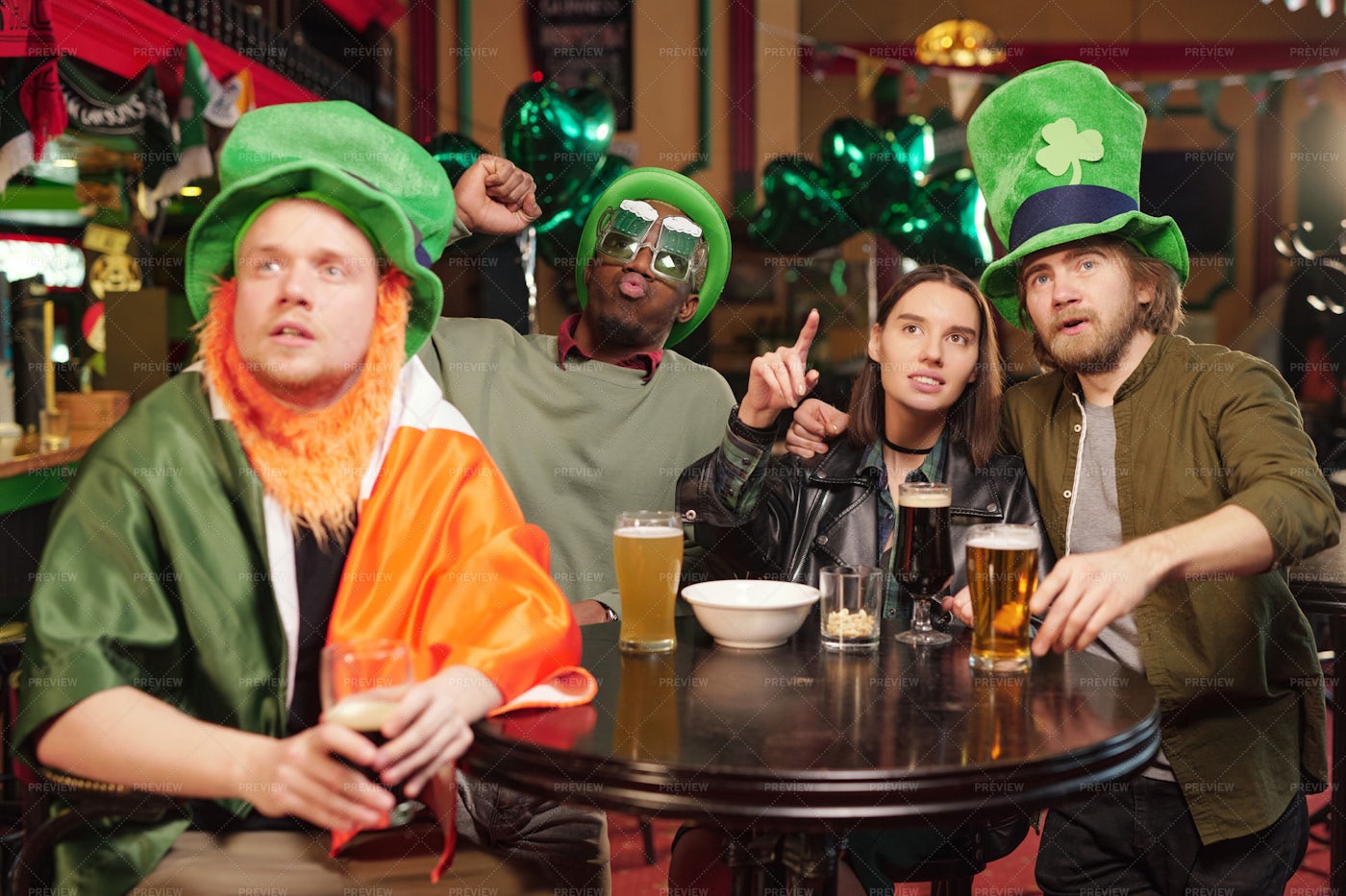 Group Of Football Fans In Pub: Stock Photos