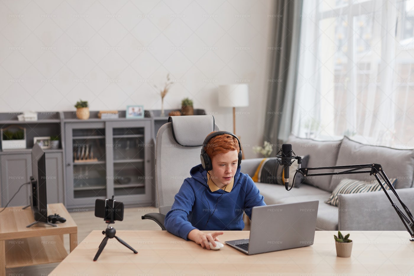 Streaming While Playing Video Games: Stock Photos