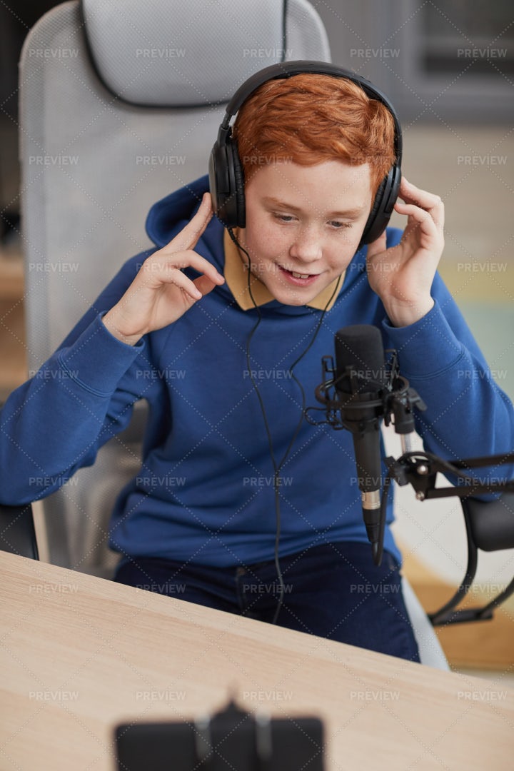 Teenage Boy Recording Blog: Stock Photos