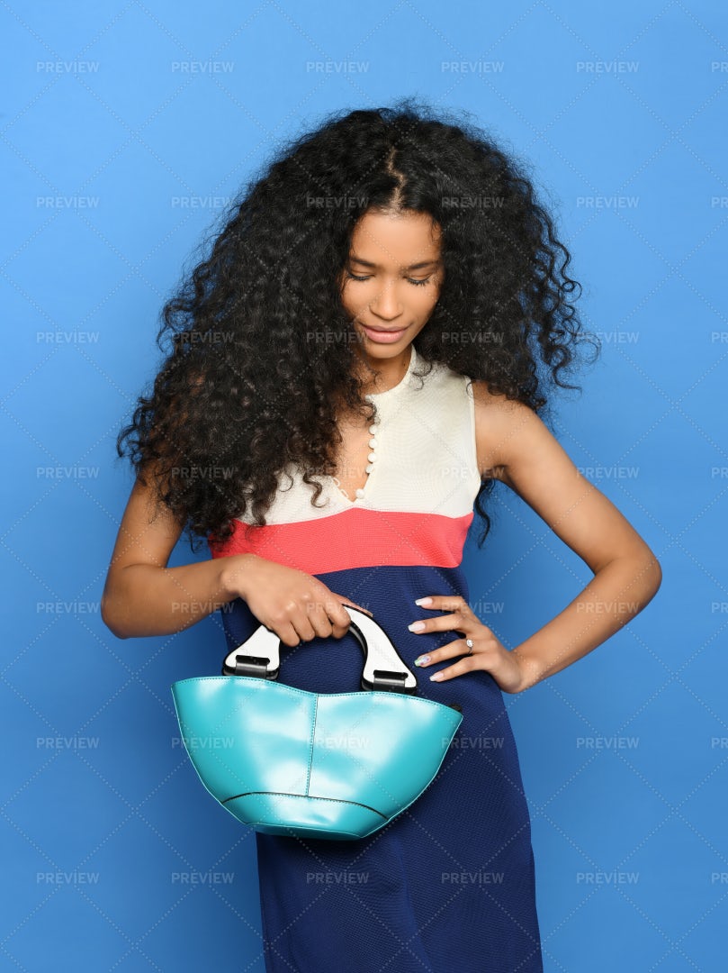 Black Woman Posing With Handbag: Stock Photos