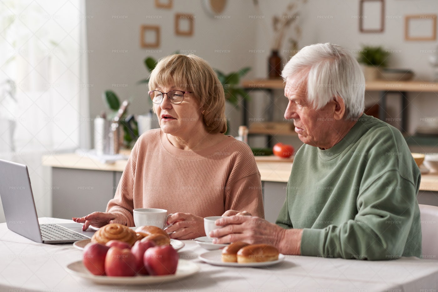 Couple Using Laptop At Home: Stock Photos
