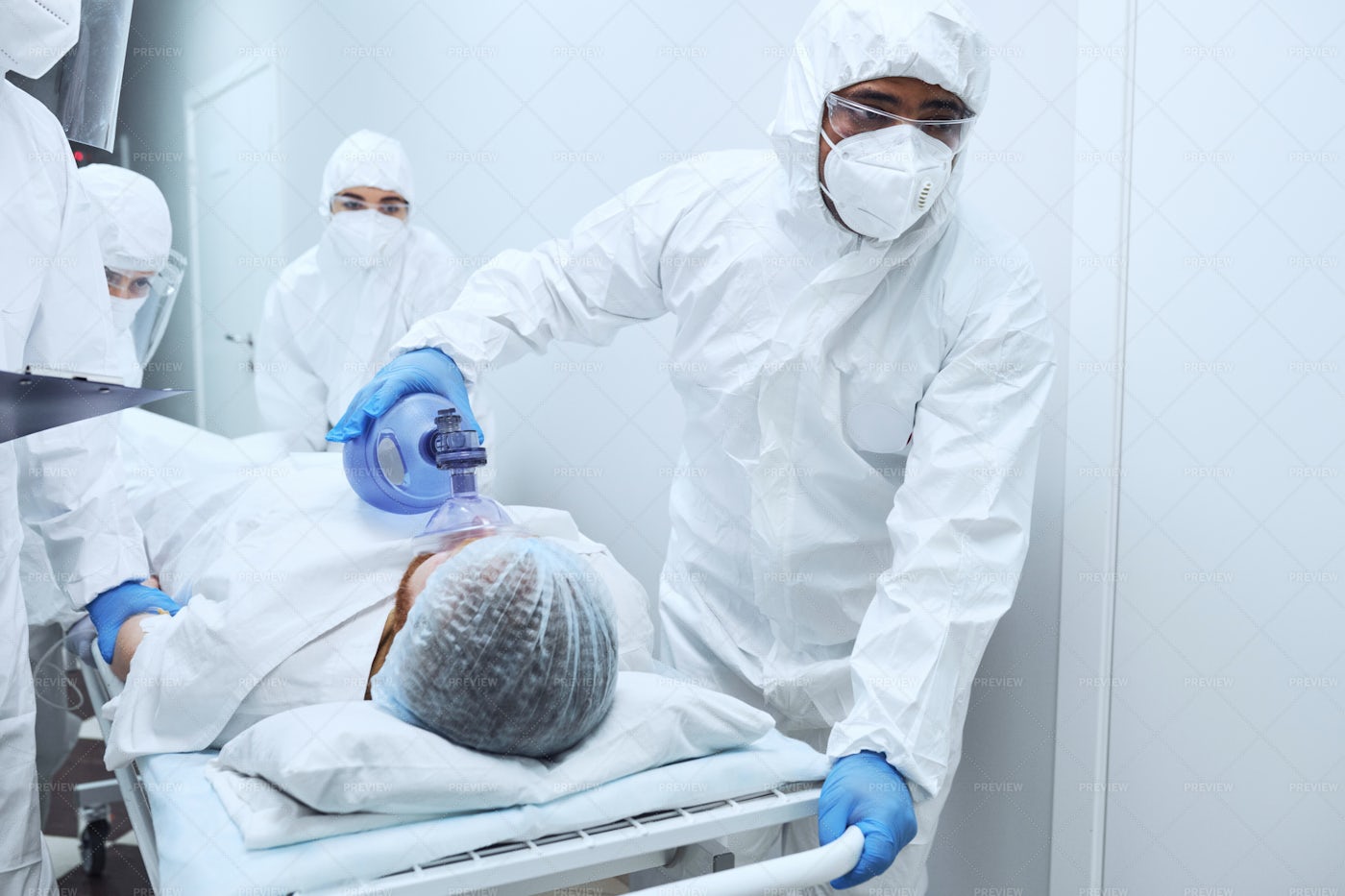 Doctors Give Resuscitation To Patient: Stock Photos
