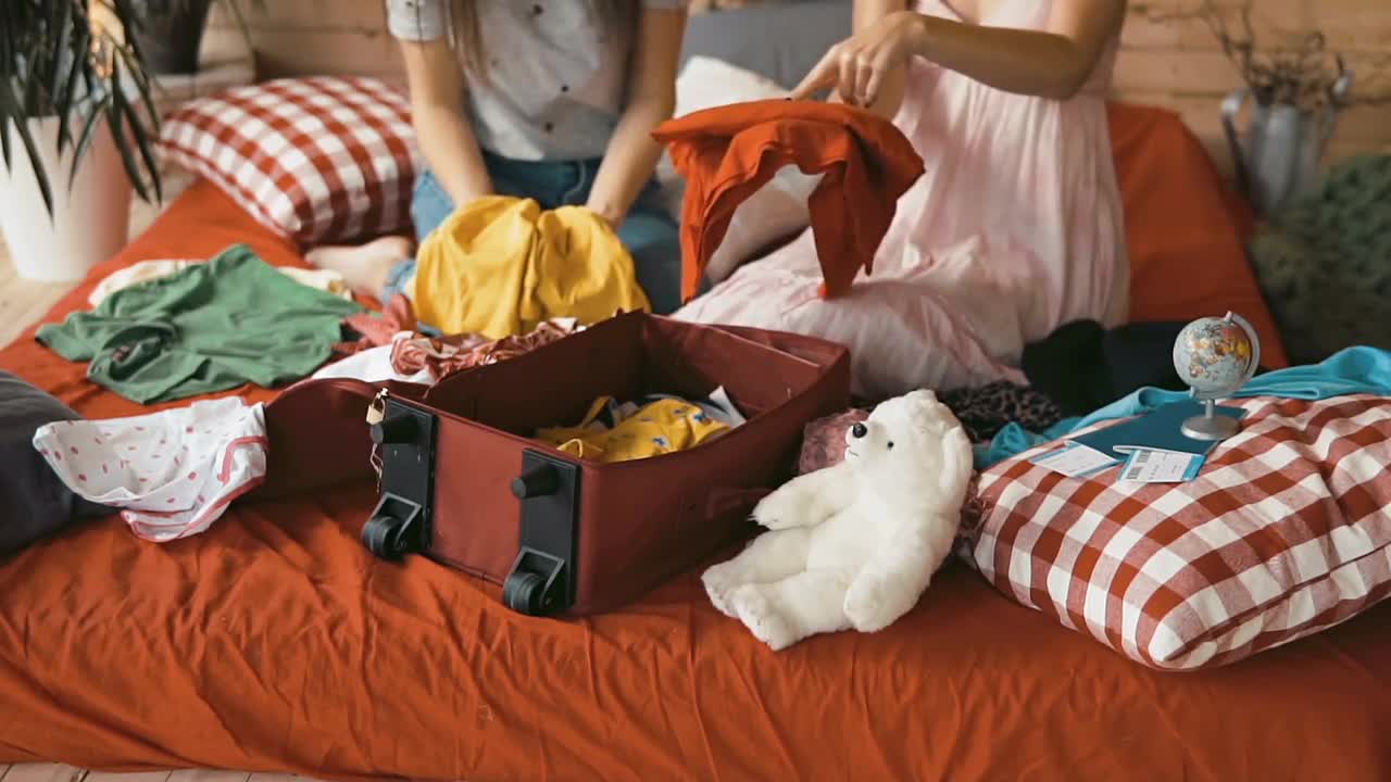 Friends Packing Red Suitcase Stock Video Motion Array