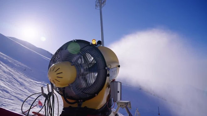 Snow cannon machine blowing artificial snow on Azuga ski domain, Prahova  Valley region, Romania, during the Winter low season, due to the lack of  natu Stock Photo - Alamy