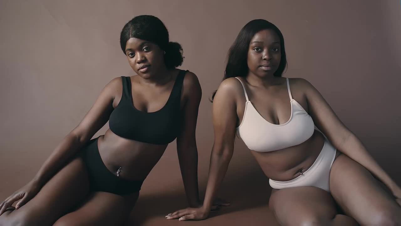 Two Beautiful Black Women In Underwear Posing In Studio Stock