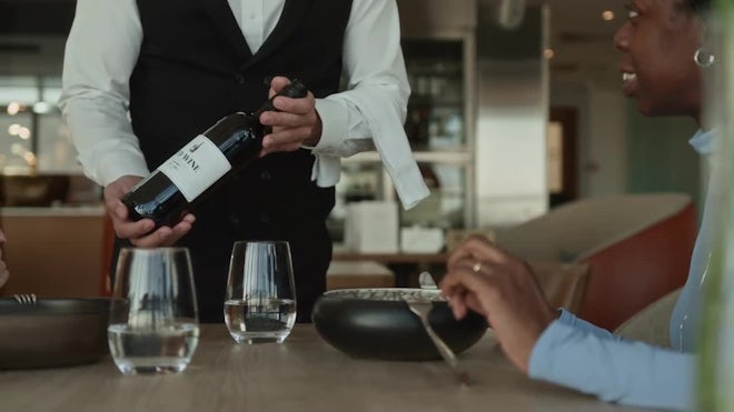 https://motionarray.imgix.net/waiter-presenting-bottle-of-wine-to-guests-at-dining-table-in-luxury-restaurant-3495273-high_0009.jpg?auto=format&fit=max&q=60&w=660